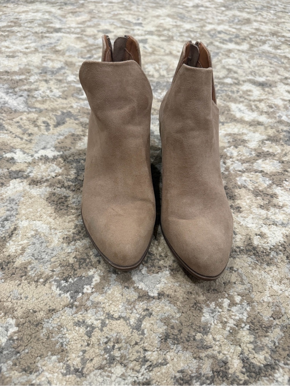 “SO” heeled booties.